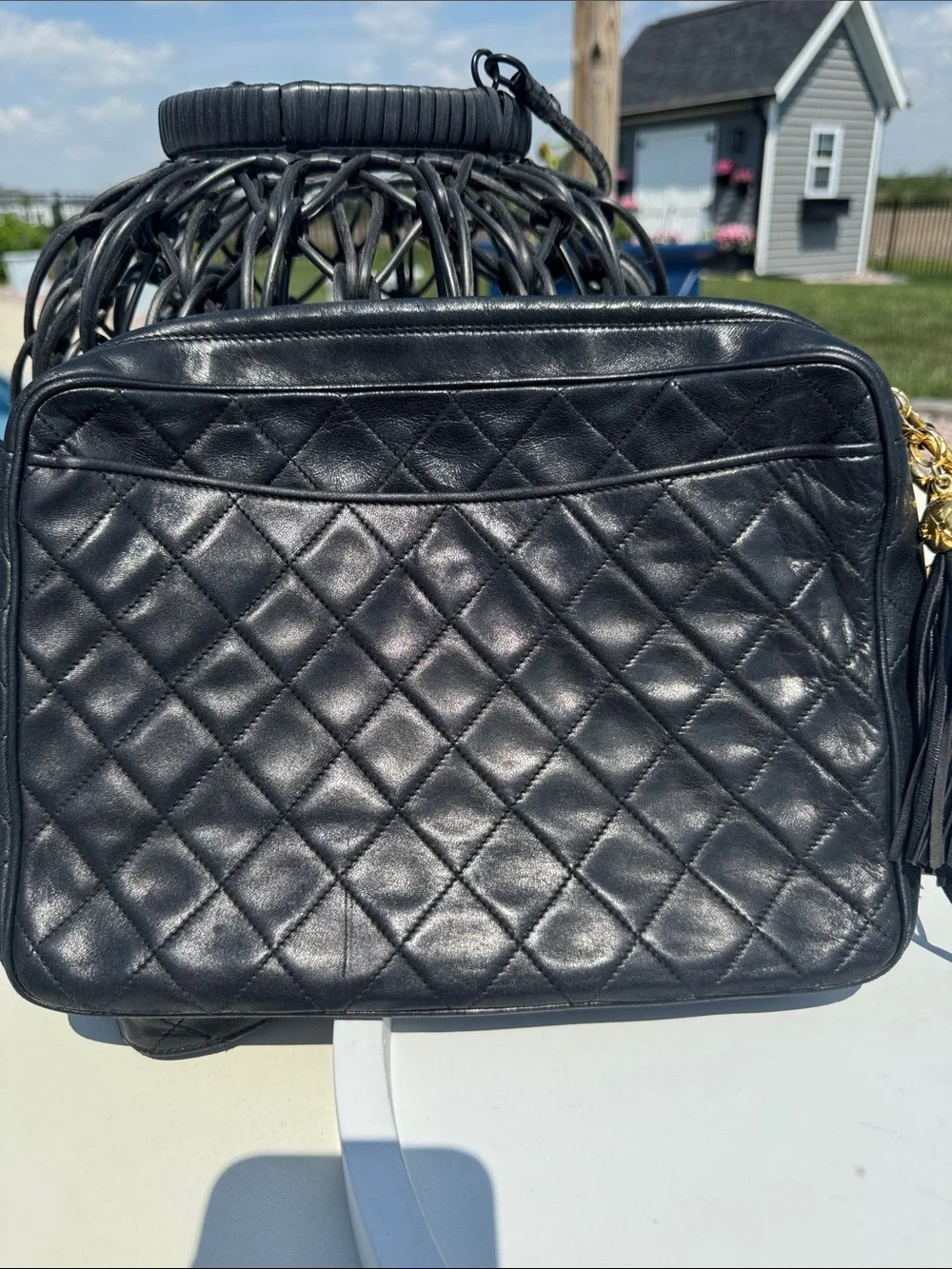 CHANEL Black Quilted Leather Shoulder Baguette with Embossed CC